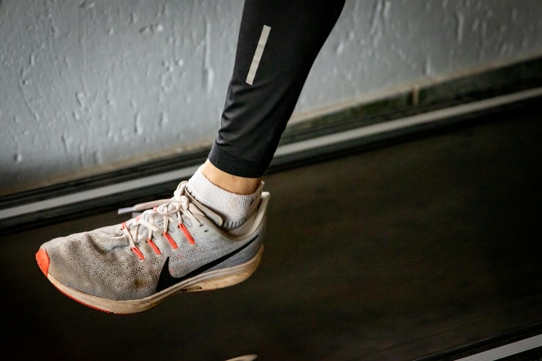 Close up of sports shoes stepping on a treadmill